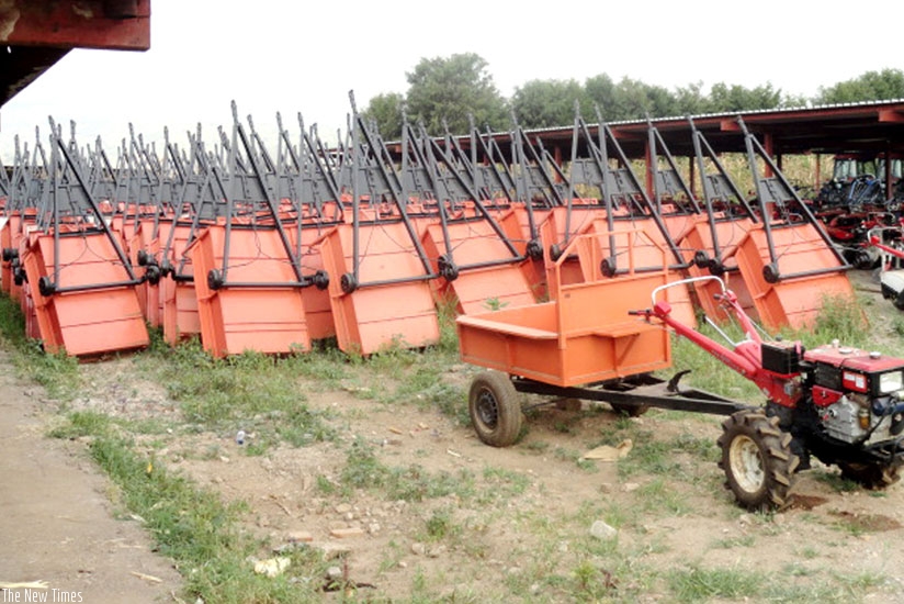 A power tiller (right) and several trailers at Minagri's Kabuye yard in Kigali. (Courtesy)