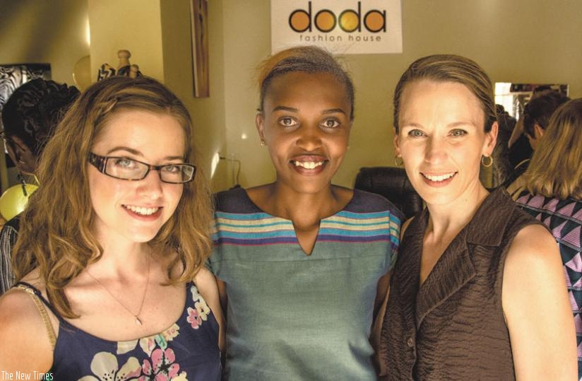 Fashion designers, (L-R) Kate Lloyd, Colombe Ituze Ndutiye and Johanne St.Louis pose for a snap.