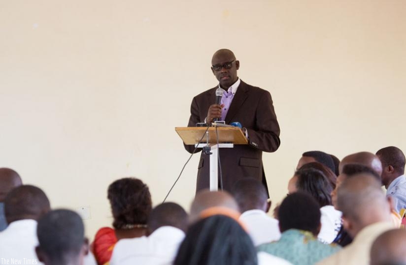 Busingye speaks at the meeting in Kigali. (T. Kisambira)