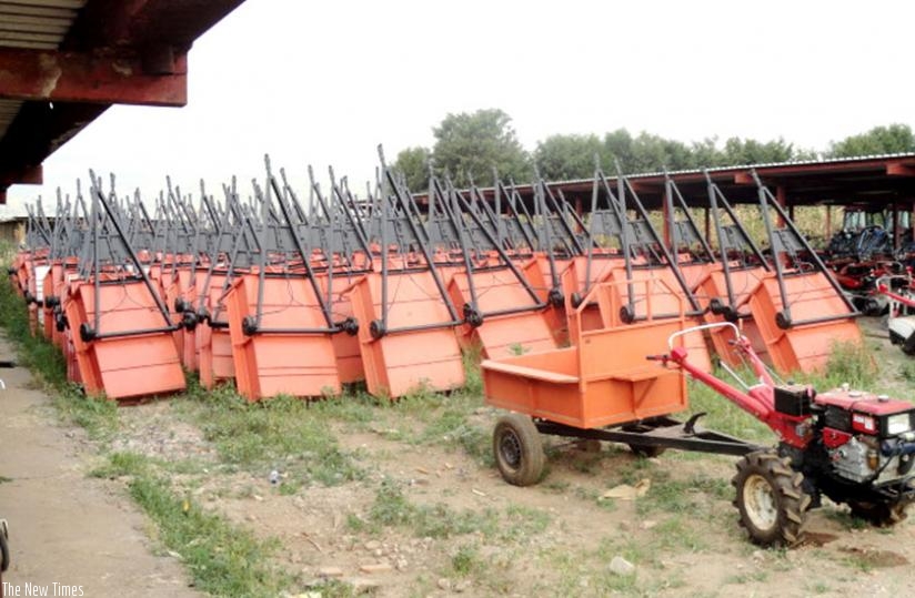 A power tiller (R) and several trailers at Minagriu2019s Kabuye store in Kigali. (File)