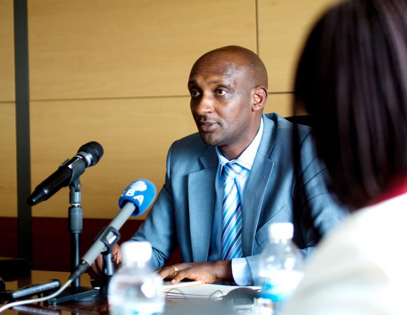Richard Tusabe, the commissioner-general of Rwanda Revenue Authority (RRA), addresses the media on Wednesday. RRA says it is plugging loopholes that allowed a former HR officer to fleece taxpayers. (File)