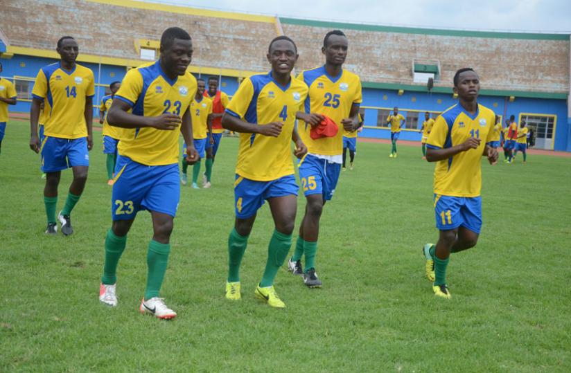 Rwanda U-23 players warming up during a training session at Amahoro stadium ahead of today's clash against Uganda U-23. (Sam Ngendahimana)