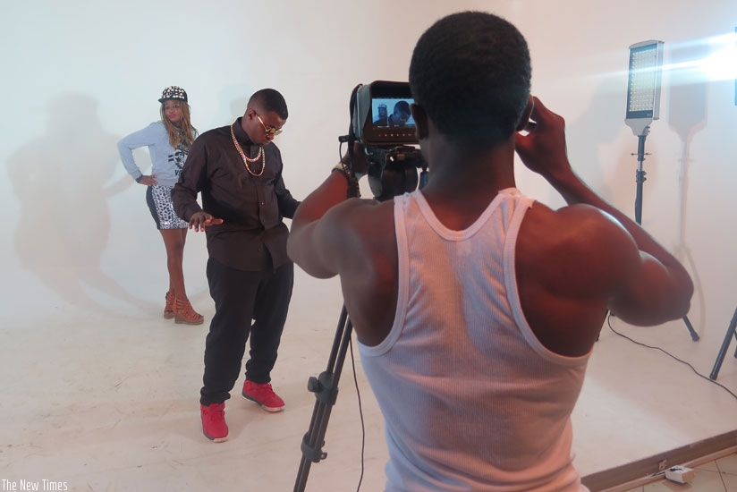 A local artiste shoots a music video inside the white room.