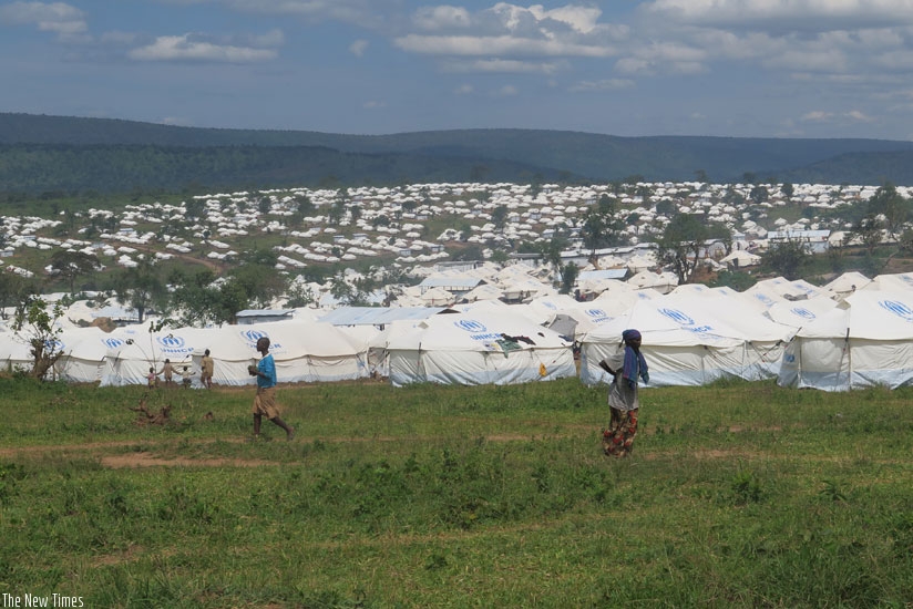 White tents that the refugees stay in.