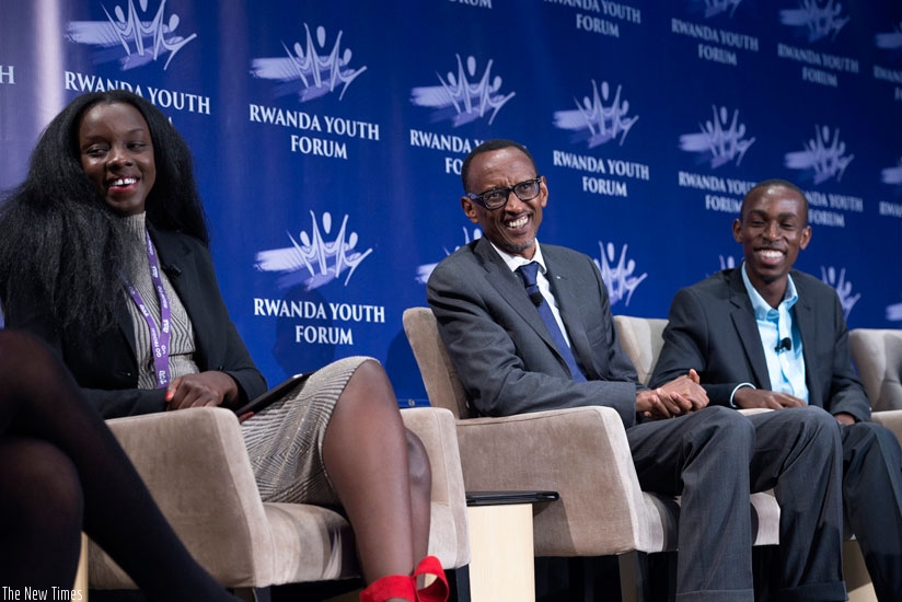 President Kagame shares a light moment with youth panelists Sandrine Irankunda (L) and Ephraim Rwamwenge at the Rwanda Youth Forum in Texas, US on Saturday. ( All photos by Village Urugwiro)