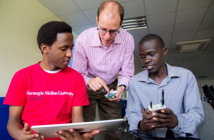 Prof. Tim Brown of Carnegie Mellon University explains to participants how 'Internet of Things' functions. (Timothy Kisambira)