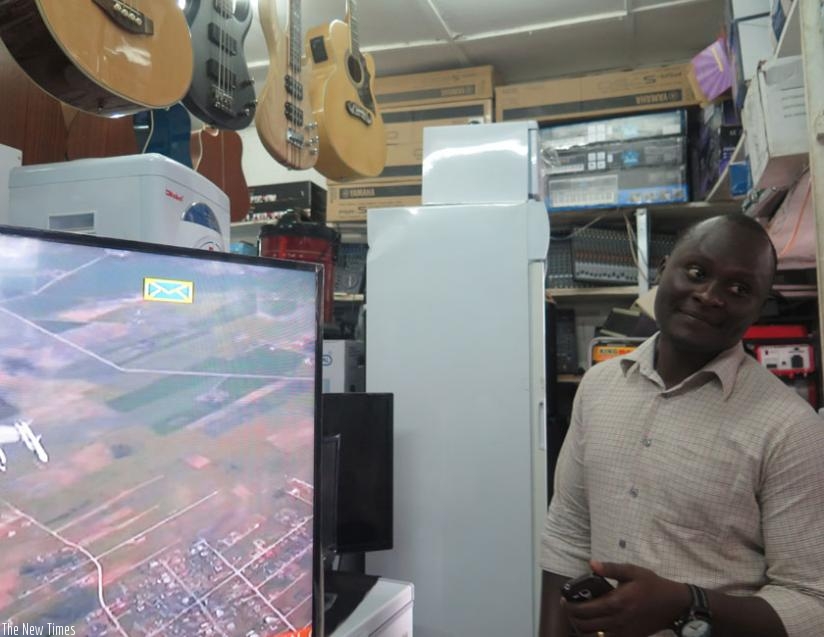 Eugene Musinga, a financial manager at TMM Sound Company in Nyarugenge District, expects government to reduce taxes for small businesses in the next budget. (Jean Mugabo)