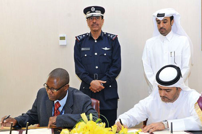ACP Tony Kuramba (L), Commissioner for INTERPOL at RNP and the Director of Anti-Narcotics General Administration at the Qatari Ministry of Internal Affairs, Brigadier Ahmed Khalifa al-Kuwari, signing the pact. (Courtesy)