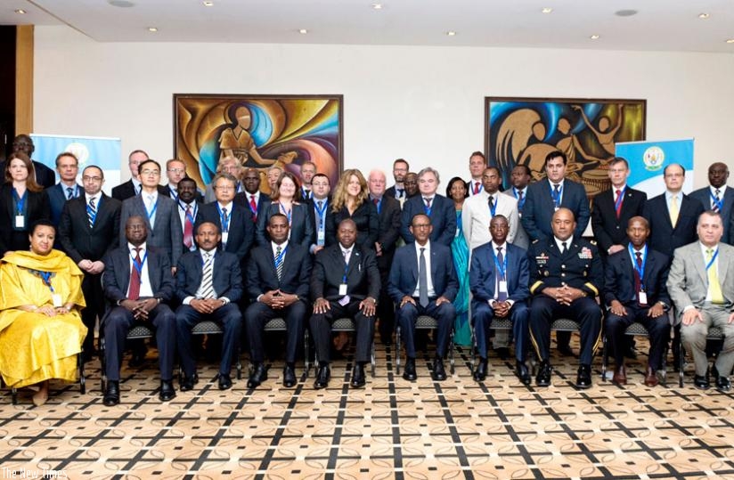 President Kagame in a group photo with participants of the International Conference on Civilian Protection in Kigali yesterday. (Village Urugwiro)