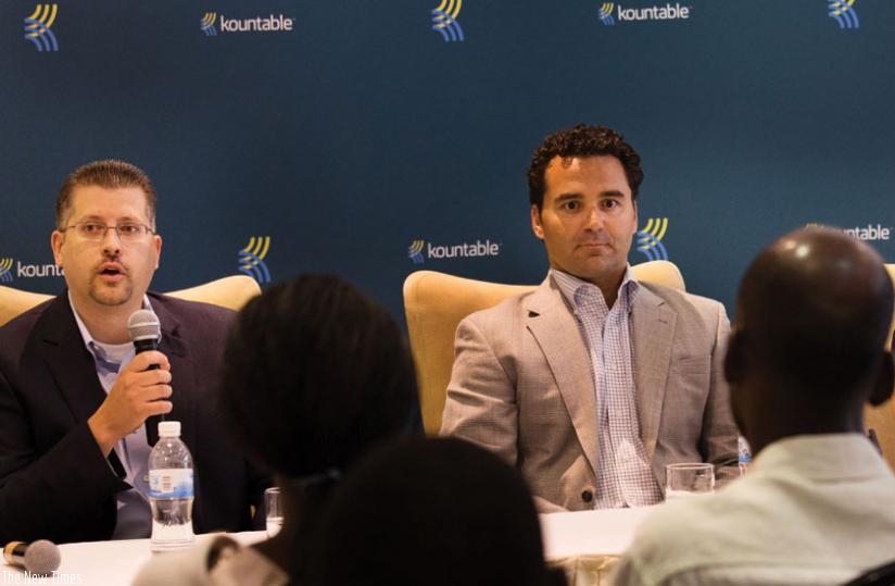 Goudy (left) and Hale address reporters in Kigali after the launch of the firm on Wednesday.  (Timothy Kisambira)