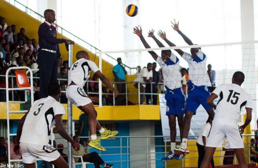 INATEK's Pierre Marshal Kwizera (Left in blue) tries to block the ball in a game last year. (File)