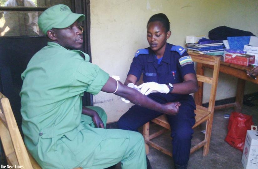 A member of the police medical team tests a DASSO officer during the campaign. (Courtesy)