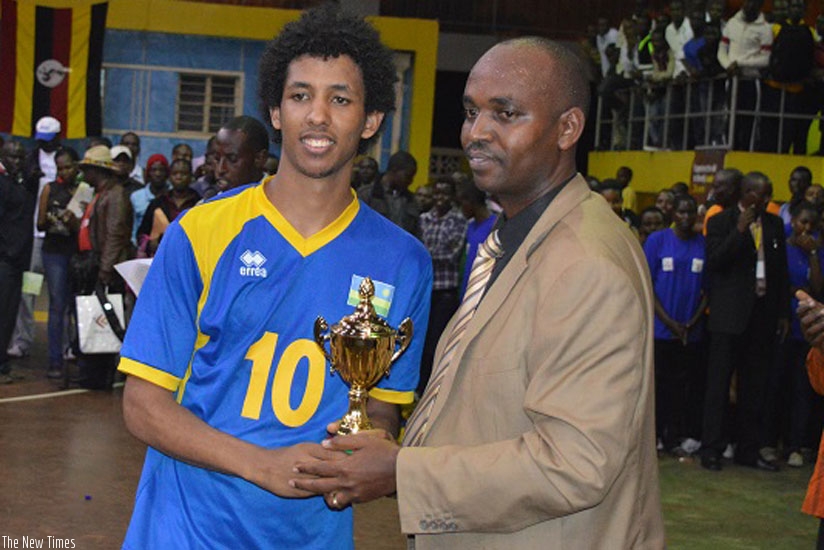 Ivan Mahoro receives the trophy for Best setter at this year's Zone V Championships. (File)