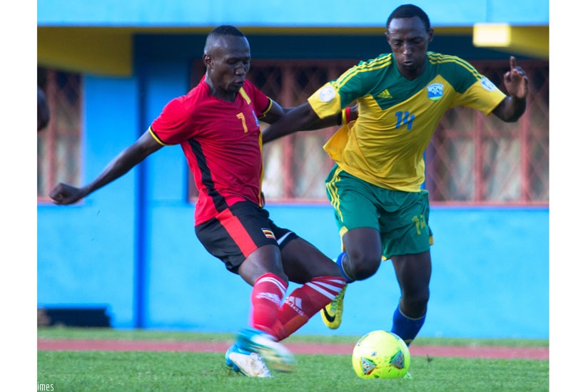 Rwanda midfielder Andrew Buteera (R) had a decent game in the first leg in Kigali last week. (Timothy Kisambira)