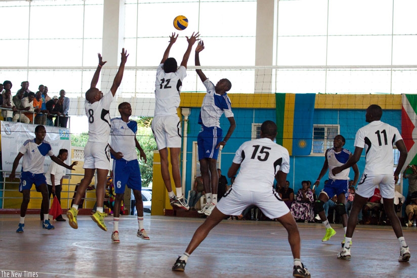 INATEK's Pierre Marshal Kwizera tries to put the ball past APR's duo of Fred Musoni (12) and Aimable Mutuyimana during last year's Genocide Memorial Tournament. (File)