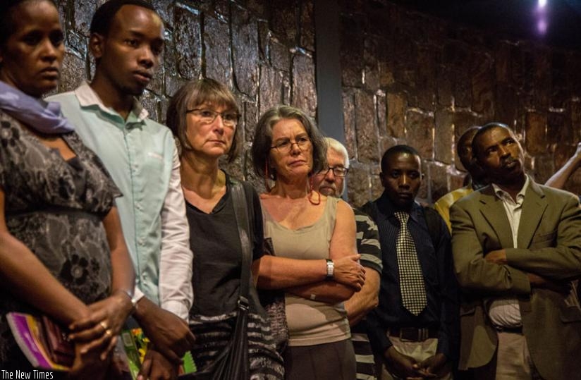 A group of visiting humanitarian activists from across the world watch a video clip of the 1994 Genocide against the Tutsi at Kigali Genocide Memorial Centre, Gisozi, yesterday. (Timothy Kisambira)