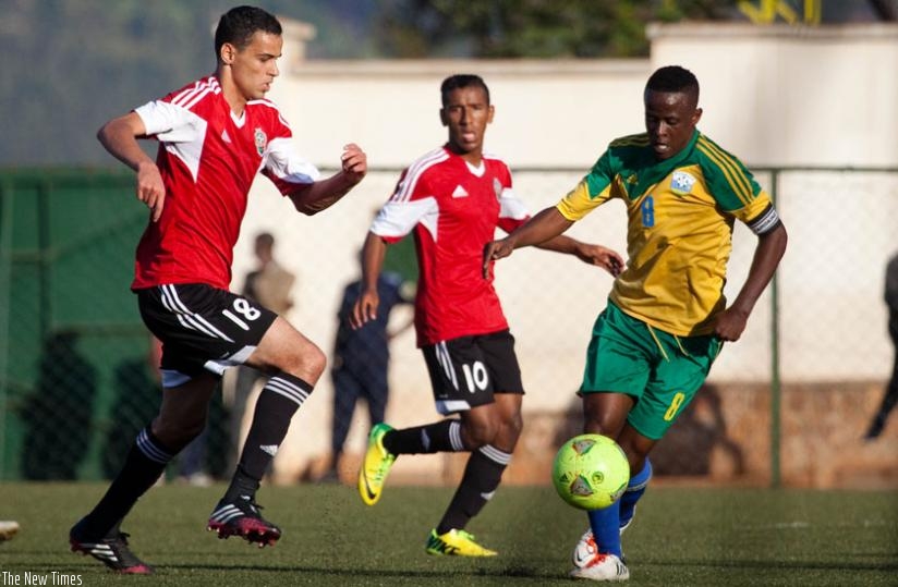 Amavubi Captain Haruna Niyonzima (with the ball) is already in the country and will attend todayu2019s training session. (File)