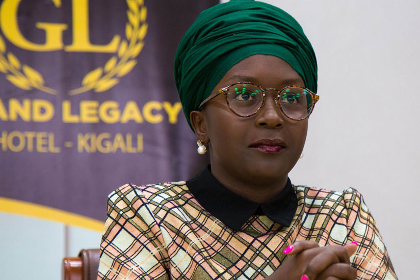 Comedienne Anne Kansiime briefs the media after her arrival in Kigali. (Timothy Kisambira)