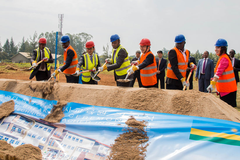 TVET State Minister Albert Nsengiyumva (C), together with other guests during the ground breaking of the facility to be constructed at the Integrated Polytechnic Regional Centre (IPRC) at Kicukiro. (Timothy Kisambira)