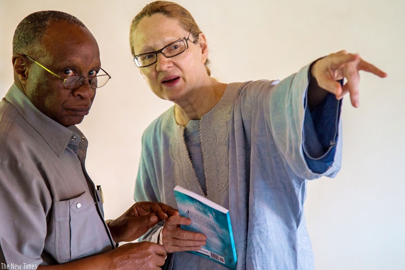 Bishop Rucyahana (L) interacts with Dr Lindner in Kigali. (Doreen Umutesi)