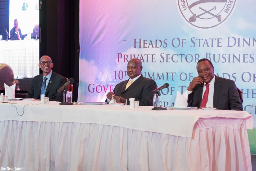 (L-R) Presidents Kagame, Museveni and Kenyatta at the dinner held with members of the private sector business forum in Kampala, yesterday. The event is part of the Northern Corridor Integration Summit. (Village Urugwiro)
