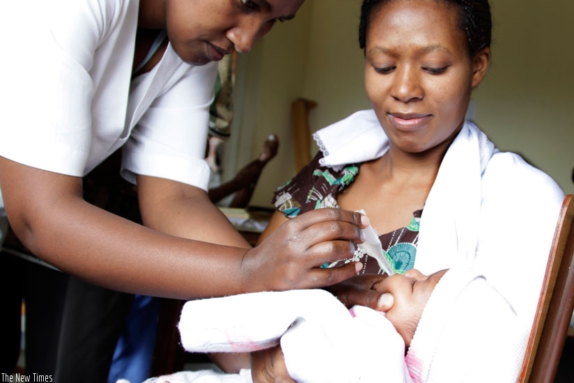 A nurse immunises a baby at Kacyiru Police Hospital. Rwanda is one of the few countries that achieved the MDGs deadline. (File)