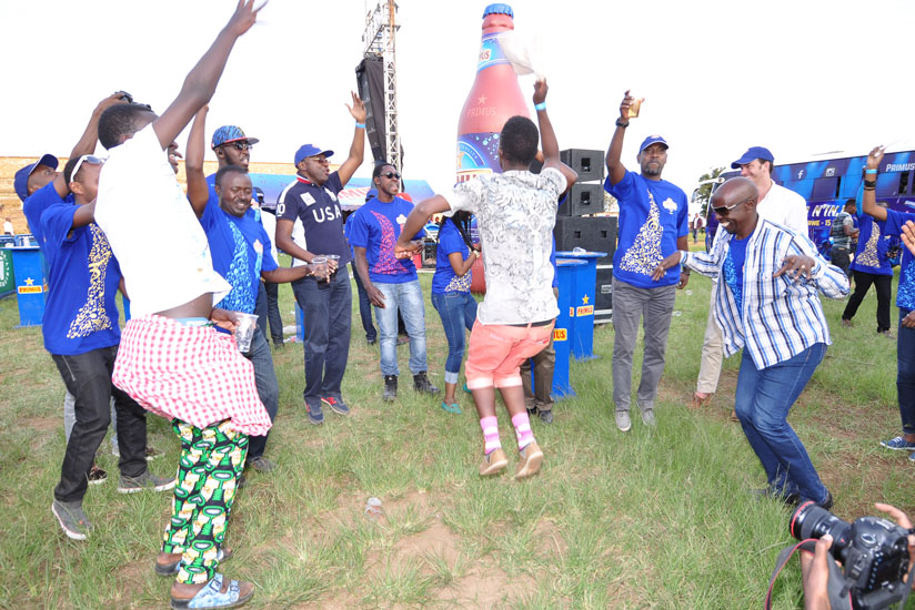 Ganyobwe. The Bralirwa team catch up after a long day.