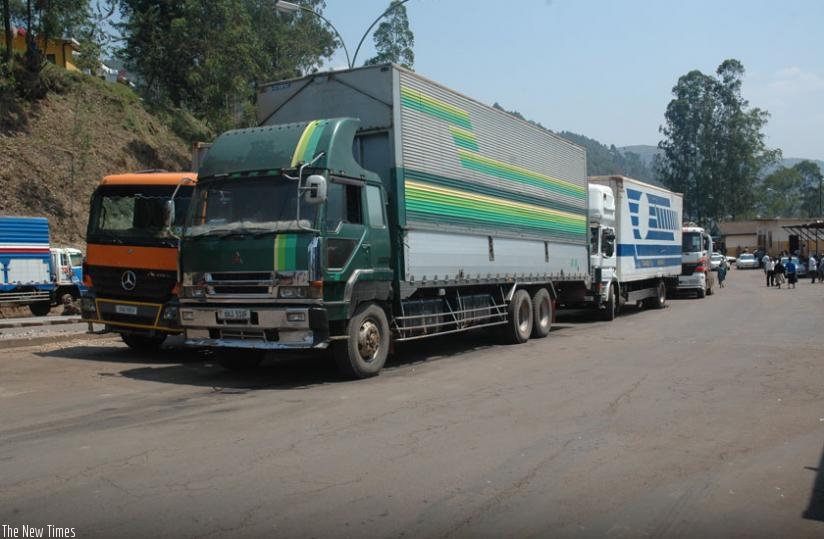 Trucks await clearance at Gatuna border between Rwanda and Uganda. (Timothy Kisambira)