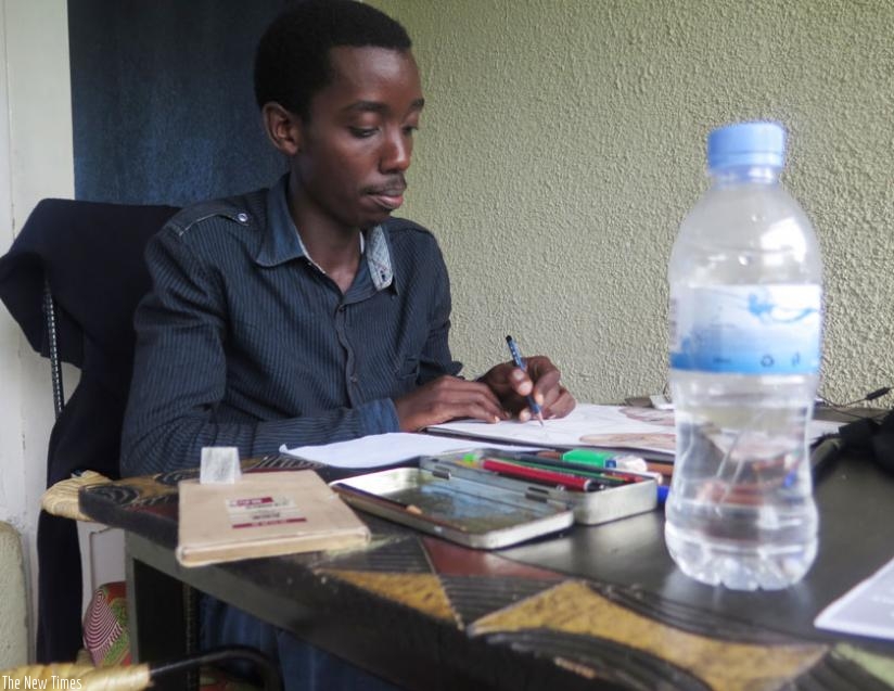 Rusagara at his place of work in Kacyiru. (Stephen Kalimba)