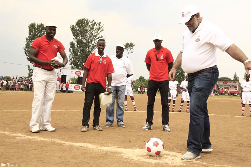 Mr. Bhullar kicking the ball to officially kick off Season 3 of Airtel Rising Stars in Rwamagana yesterday. (Courtesy)