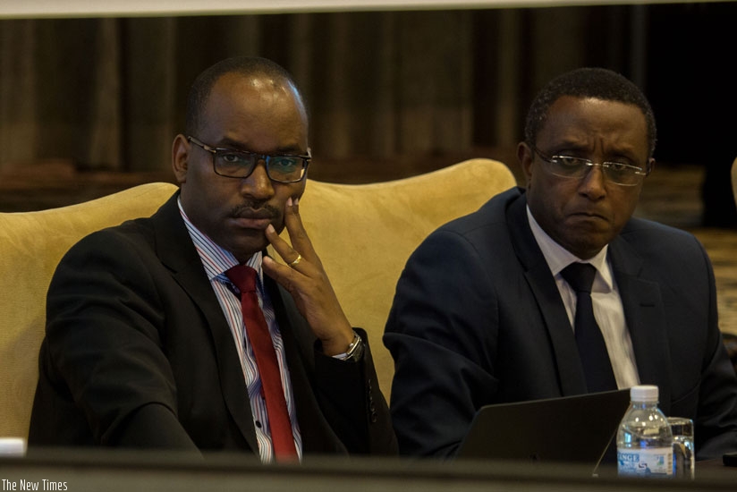 Musabyimana (L) and Dr Biruta during the event on Friday, in Kigali. (Timothy Kisambira)