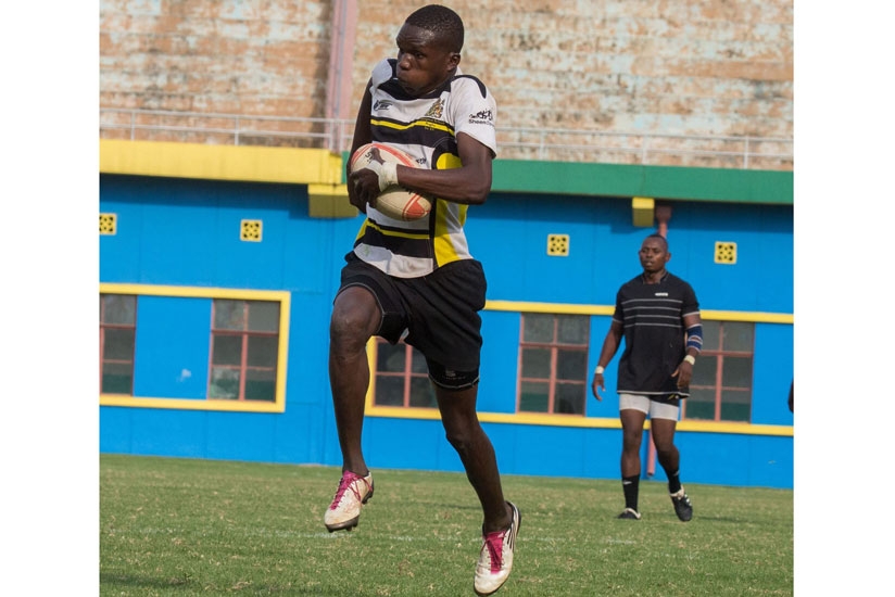 Jinja Hipposu2019 Johnson Bayiga (with the ball) charges on a run as his teammate Derrick Mugwanya looks on. (T. Kisambira)