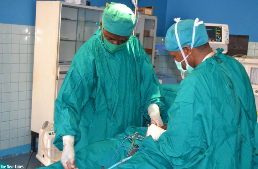 Surgeons operate on a patient at Ruhengeri hospital. (Jean d'Amour Mbonyinshuti)
