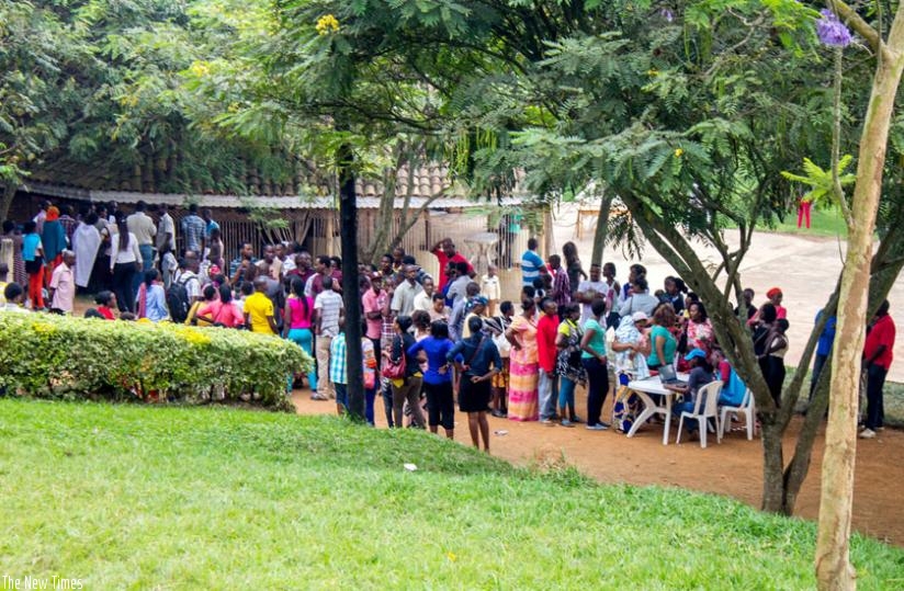 Burundian refugees living away from camps register at a Red Cross centre in Kigali on Tuesday. (Mugisha)