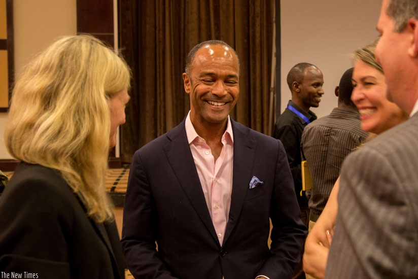 Pierre Prosper (C), the lead prosecutor in the Akayesu trial, shares a light moment with the US Ambassador to Rwanda after the premiere of The Uncondemned documentary. Prosper featured in the documentary. (Doreen Umutesi)