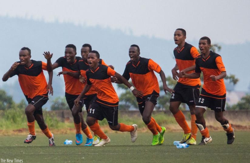 Isonga players celebrate after defeating AS Kigali in the Peace Cup yesterday at Mumena stadium. (T. Kisambira)
