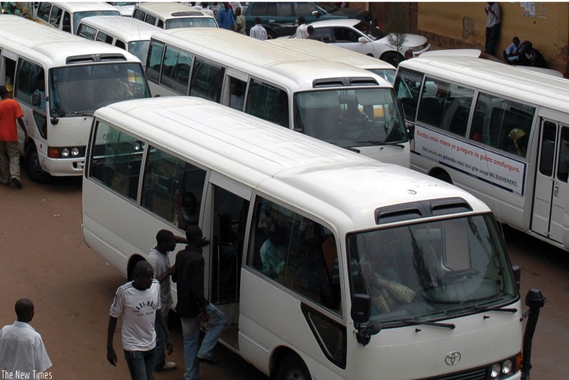 Public transport buses at Nyabugogo terminal. Motor vehicle owners are some of the people accused of stage-managing accidents to claim compensation from insurance firms. (File)