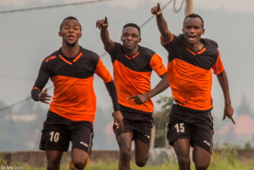 Isonga FC players celebrate after knocking out AS Kigali in the round of 16. The relegated side reached the semis after eliminating Espoir. (T. Kisambira)