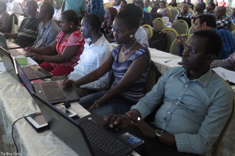 Participants follow proceedings during a training at Classic Hotel last week. (Solomon Asaba)