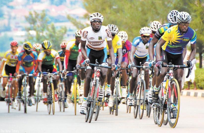 Team Rwandas rider Nathan Byukusenge (R) leads a peloton during last years Tour du Rwanda. (File)