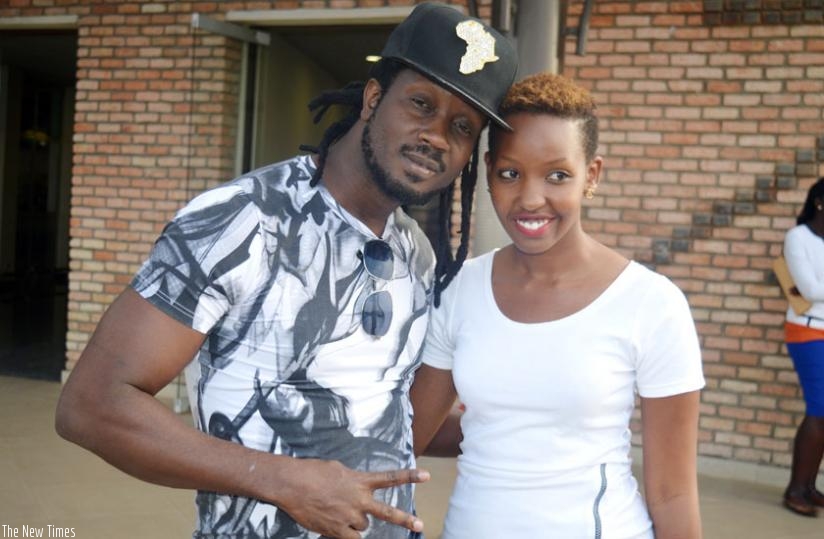 Sandra Teta, the organiser of the show poses with Ugandan singer, Bebe Cool. (Stephen Kalimba)