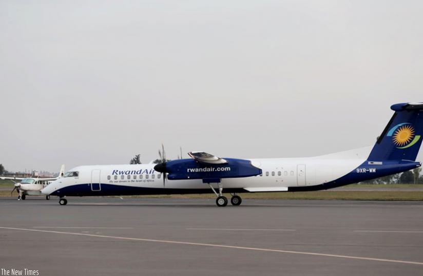 RwandAir's new Bombardier Q400 NextGen Turboprop Airliner torches down at Kigali International Airport yesterday. (Courtesy)