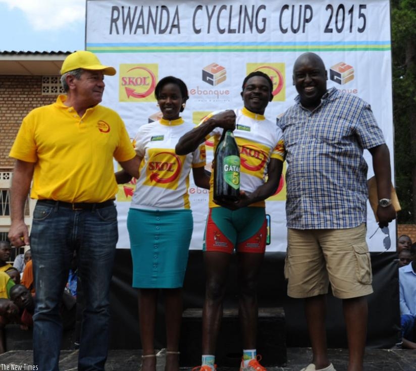 Cine Elmay's Joseph Biziyaremye (with bottle) emerged winner of the men's elite road race yesterday in the National Cycling Championships. (Courtesy)