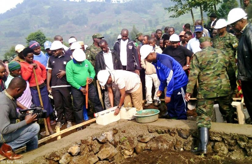 Dr Biruta launches the construction of the model village in Nyabihu on Friday. (Jean d'Amour Mbonyinshuti)