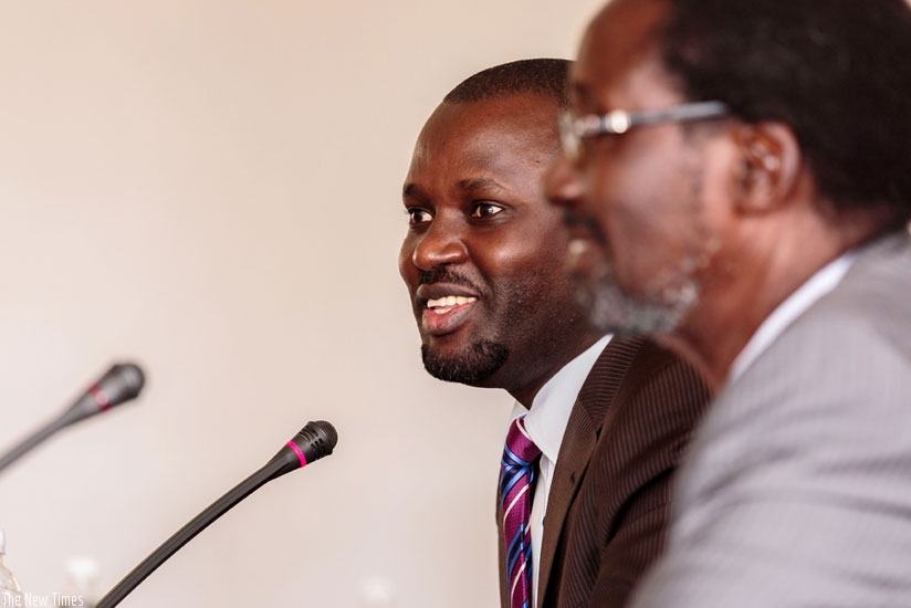 Gasana (R) speaks before PAC yesterday. (All photos by Timothy Kisambira)