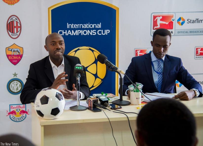 Hussein Kamanzi (L) addresses the media on Monday at the Star Times Media offices. (Doreen Umutesi)