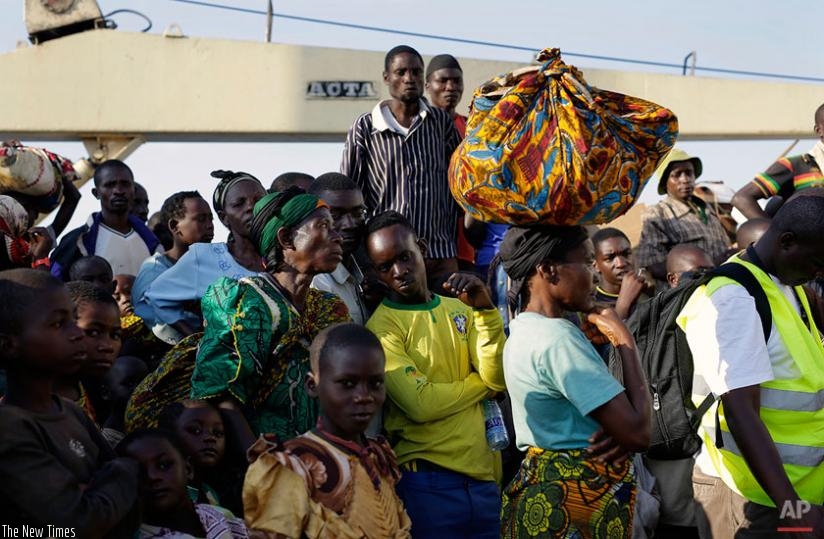 Burundian refugees who fled the countryu2019s violence ahead of the elections on arrival in Kigoma, Tanzania, after crossing Lake Tanganyika on May 23. (Net photo)