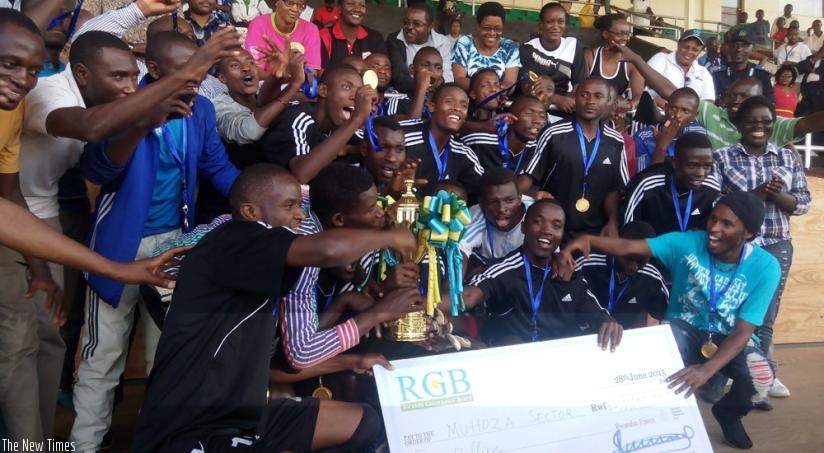 Muhoza Sector players celebrate after winning the 2015 Umurenge Kagame Cup on Wednesday at Amahoro stadium. (Courtesy)