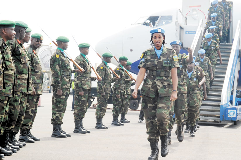 As was the case during the Liberation struggle, women today play a major role in the army. Here, an RDF female peacekeeper leads colleagues back home from a mission. (File)