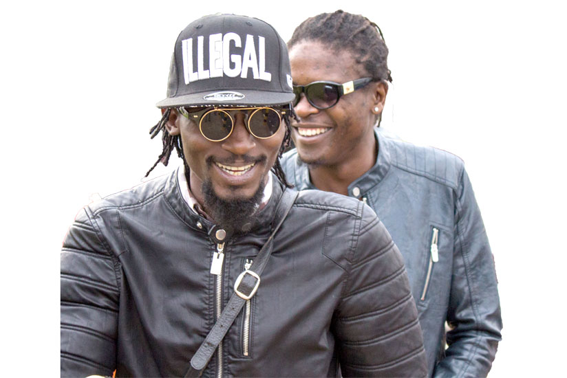 Radio (in front) and Weasel upon their arrival at Kigali International Airport ahead of today's concert at Kigali Serena hotel. (Fernand Mugisha)